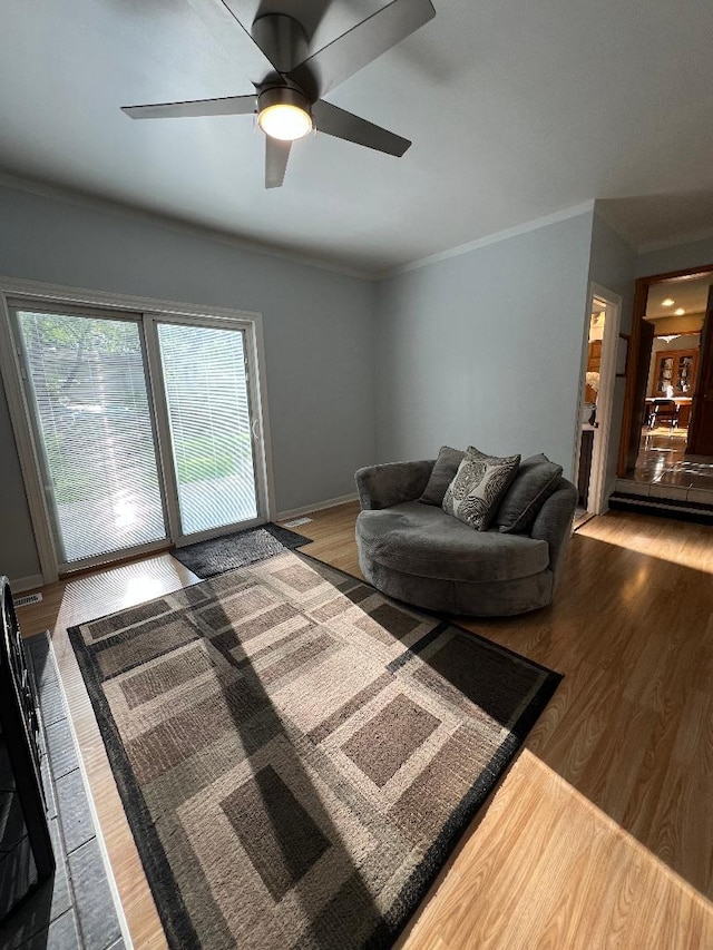 1416 S Robert Dr, Mount Prospect, IL 60056 - living room featuring wood finished floors, ornamental molding, and ceiling fan