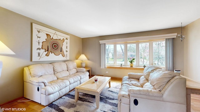 1416 S Robert Dr, Mount Prospect, IL 60056 - living room with light wood-type flooring and baseboards