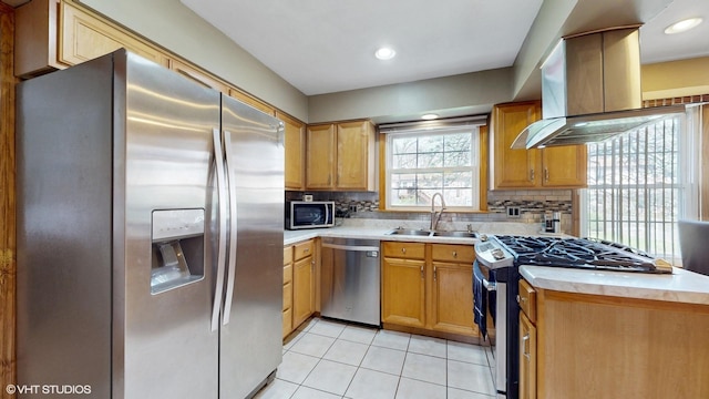 1416 S Robert Dr, Mount Prospect, IL 60056 - kitchen featuring stainless steel appliances, wall chimney exhaust hood, light tile patterned flooring, light countertops, and tasteful backsplash