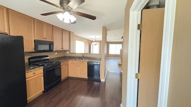 2434 Roxbury Ln, Montgomery, IL 60538 - kitchen with black appliances, dark wood-style flooring, ceiling fan, and dark countertops