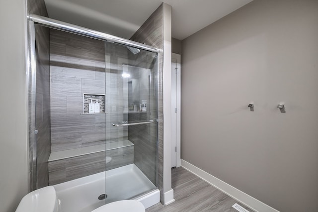 2412 Sharon Ct, Naperville, IL 60564 - bathroom with a stall shower and wood finished floors