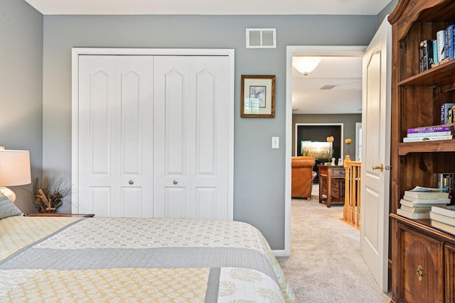 147 Fulbright Ln, Schaumburg, IL 60194 - bedroom featuring a closet and light carpet