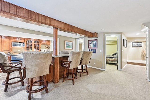 147 Fulbright Ln, Schaumburg, IL 60194 - indoor bar with stainless steel microwave and light colored carpet