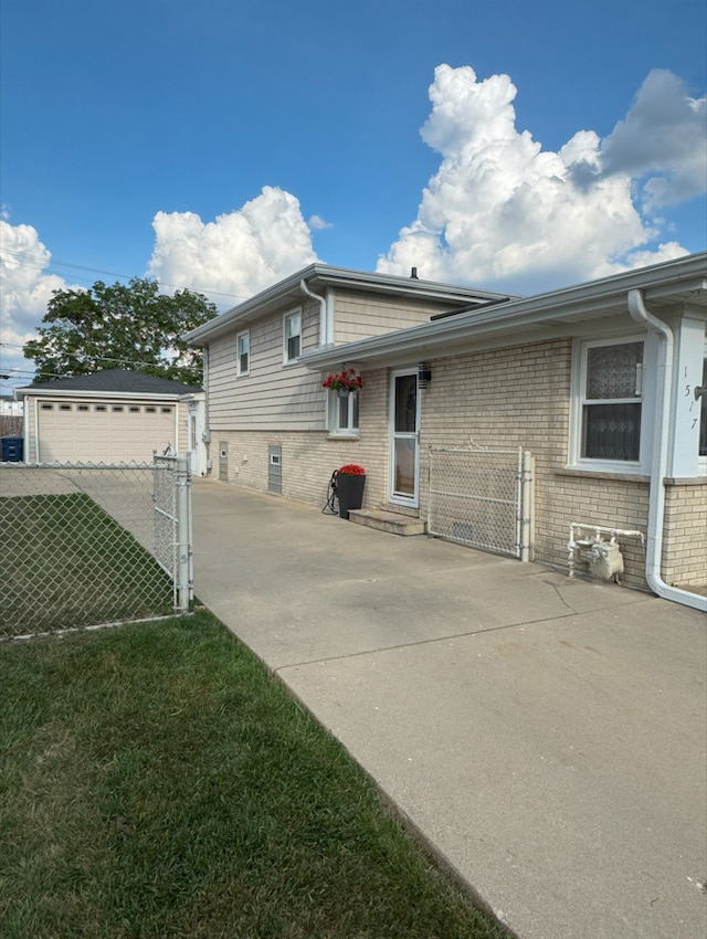 1517 Webster Ln, Des Plaines, IL 60018 - rear view of house featuring a garage and brick siding