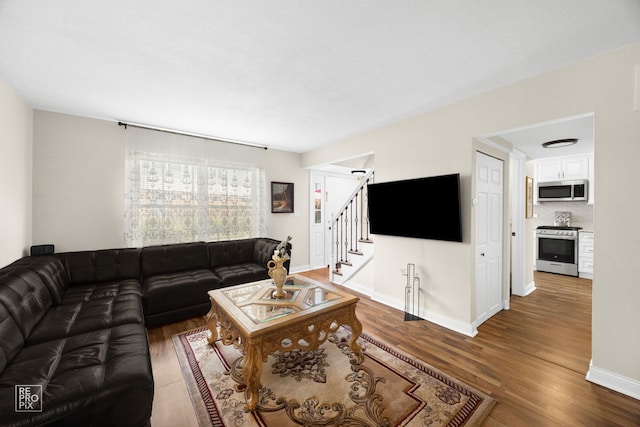 7312 Winthrop Way Unit 11, Downers Grove, IL 60516 - living room featuring stairs and wood finished floors