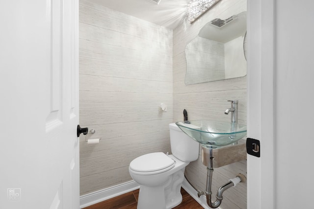 7312 Winthrop Way Unit 11, Downers Grove, IL 60516 - half bathroom with toilet and wood finished floors