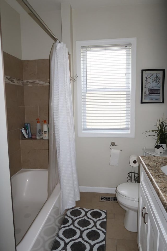 5125 N La Crosse Ave, Chicago, IL 60630 - full bathroom with vanity, tile patterned flooring, and shower / tub combo