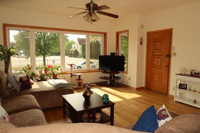 5125 N La Crosse Ave, Chicago, IL 60630 - living area featuring healthy amount of natural light, ceiling fan, and wood finished floors