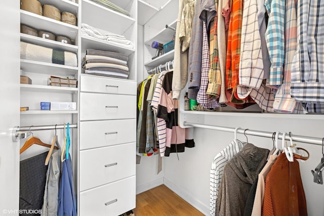 653 N Kingsbury St Unit 2202, Chicago, IL 60654 - walk in closet featuring wood finished floors