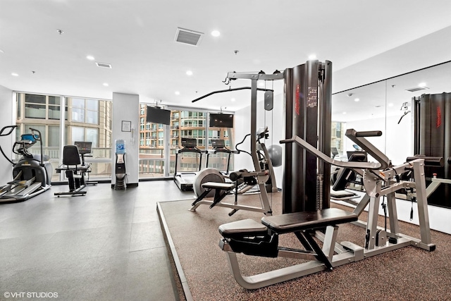 653 N Kingsbury St Unit 2202, Chicago, IL 60654 - workout area with healthy amount of natural light, floor to ceiling windows, and recessed lighting
