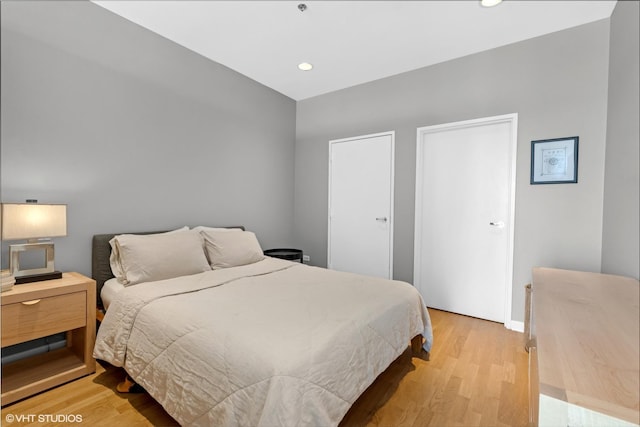 653 N Kingsbury St Unit 2202, Chicago, IL 60654 - bedroom featuring light wood-style flooring and recessed lighting