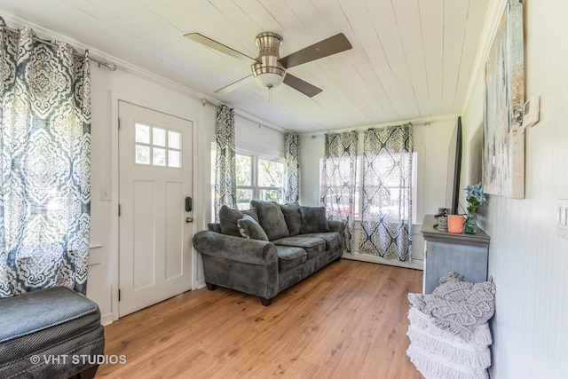 13861 Butternut St, Cedar Lake, IN 46303 - living room featuring ornamental molding, a ceiling fan, light wood-style flooring, and wooden ceiling