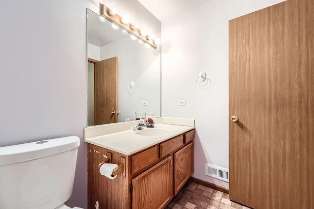 28 W Pheasant Trl Unit 28, Lake In The Hills, IL 60156 - half bathroom featuring vanity and stone finish floors
