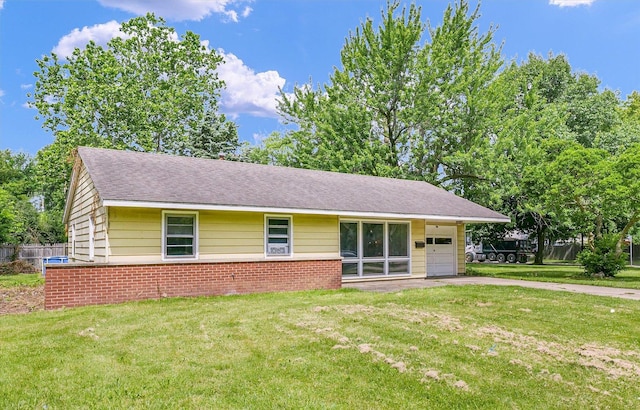 1413 Garden Hills Dr, Champaign, IL 61821 - view of front facade with brick siding, a garage, asphalt driveway, and roof with shingles
