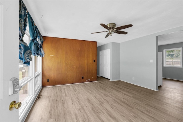 1413 Garden Hills Dr, Champaign, IL 61821 - empty room with wood finished floors and ceiling fan