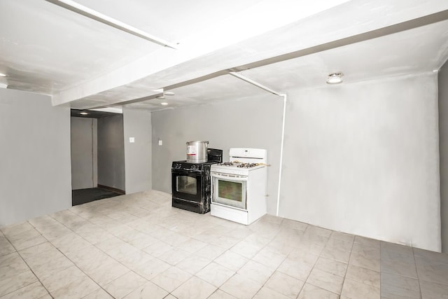 6455 S Marshfield Ave, Chicago, IL 60636 - kitchen featuring white range with gas cooktop and black range with gas stovetop