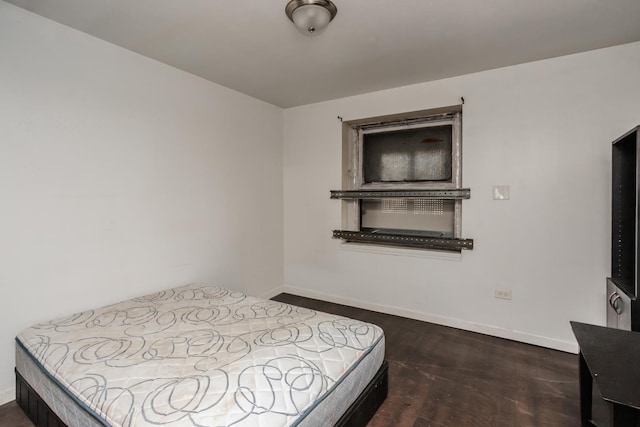 6455 S Marshfield Ave, Chicago, IL 60636 - bedroom featuring baseboards and wood finished floors
