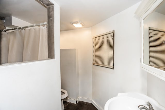 6455 S Marshfield Ave, Chicago, IL 60636 - full bath featuring wood finished floors and a shower with shower curtain
