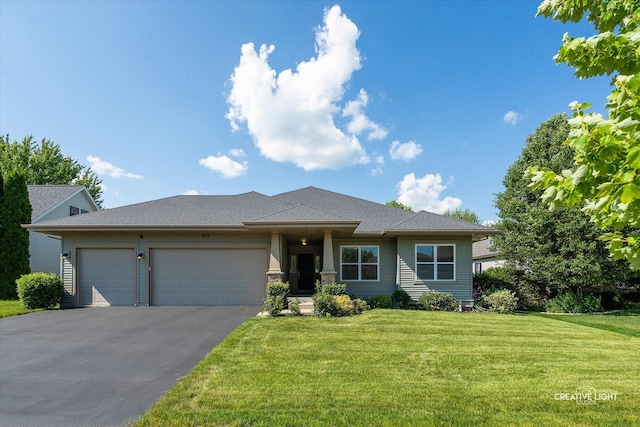 433 Davis Dr, Sycamore, IL 60178 - view of front facade featuring driveway, an attached garage, a front lawn, and a shingled roof