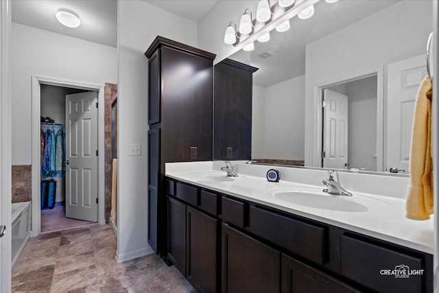 433 Davis Dr, Sycamore, IL 60178 - bathroom with a shower stall, double vanity, and a walk in closet