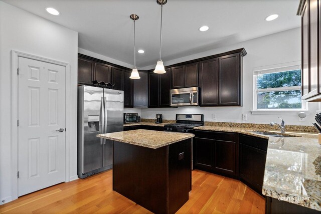 433 Davis Dr, Sycamore, IL 60178 - kitchen featuring stainless steel appliances, light stone countertops, light wood finished floors, and recessed lighting