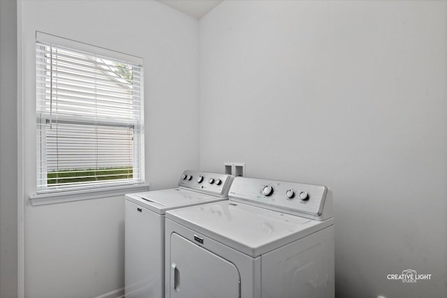 433 Davis Dr, Sycamore, IL 60178 - laundry area featuring separate washer and dryer and plenty of natural light