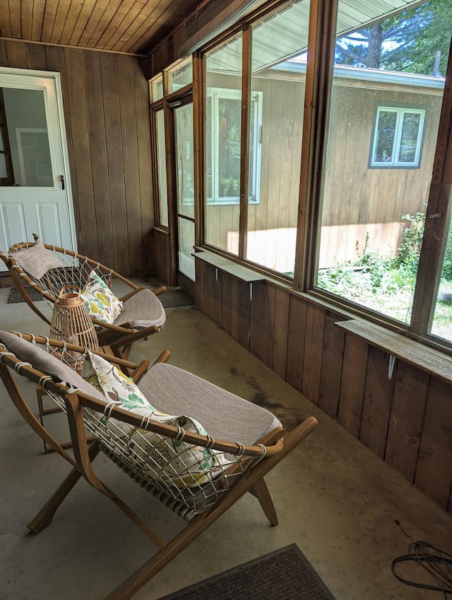 1437 S Plum Ave, Freeport, IL 61032 - sunroom / solarium featuring wooden walls and wooden ceiling