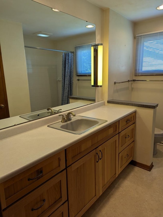 1437 S Plum Ave, Freeport, IL 61032 - bathroom featuring vanity, curtained shower, and recessed lighting