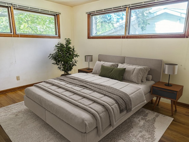 1437 S Plum Ave, Freeport, IL 61032 - bedroom featuring wood finished floors and baseboards