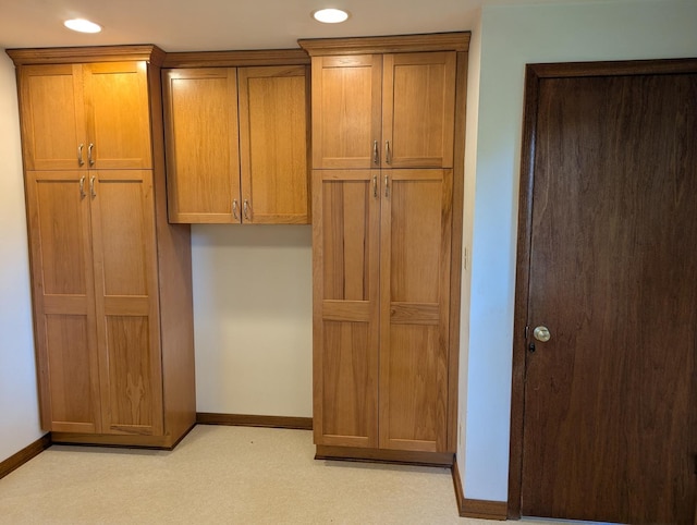 1437 S Plum Ave, Freeport, IL 61032 - kitchen featuring brown cabinetry and recessed lighting