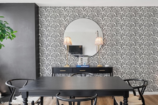 33 E Cedar St Unit 8G, Chicago, IL 60611 - dining room featuring wallpapered walls and wood finished floors