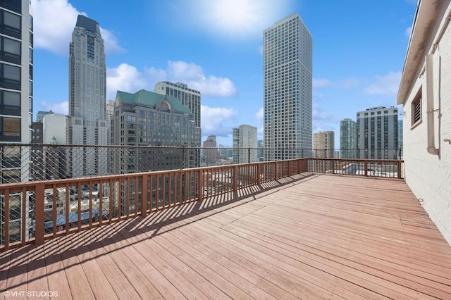 33 E Cedar St Unit 8G, Chicago, IL 60611 - wooden terrace with a skyline view