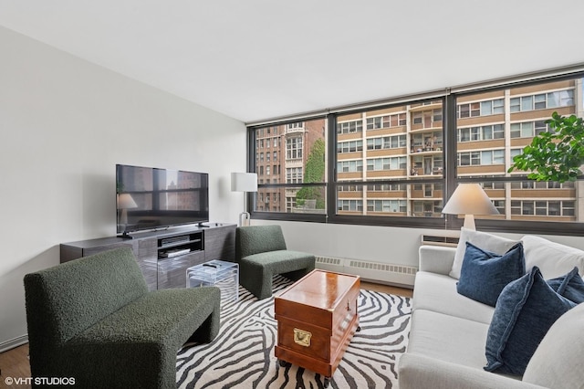 33 E Cedar St Unit 8G, Chicago, IL 60611 - living area with a baseboard heating unit and wood finished floors