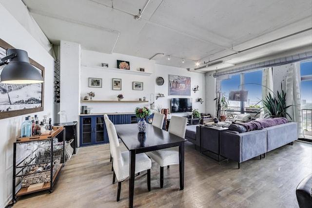 1530 S State St Unit 14O, Chicago, IL 60605 - dining area featuring light wood finished floors and track lighting