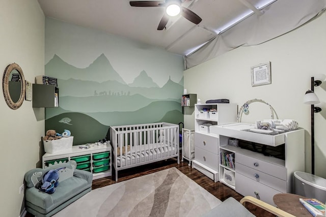 1530 S State St Unit 14O, Chicago, IL 60605 - bedroom featuring a nursery area, wood finished floors, and a ceiling fan