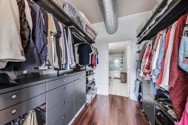 1530 S State St Unit 14O, Chicago, IL 60605 - walk in closet with dark wood-type flooring
