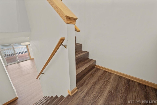 1916 Middlebury Dr Unit 1916, Aurora, IL 60503 - staircase featuring wood finished floors and baseboards