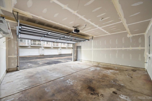 1916 Middlebury Dr Unit 1916, Aurora, IL 60503 - garage featuring a garage door opener
