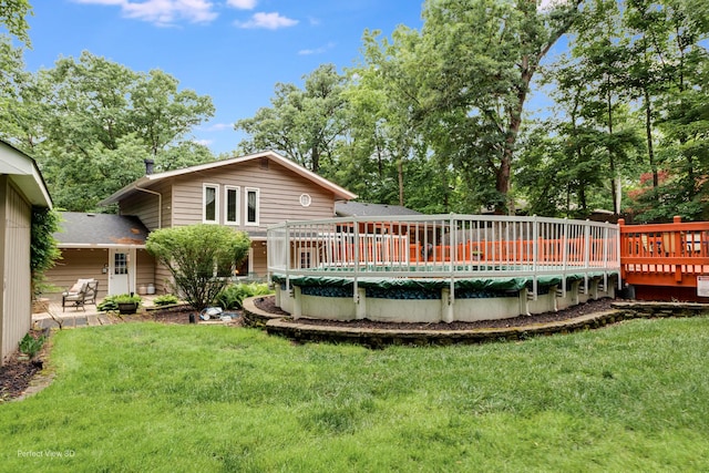 20131 E Brightway Dr, Mokena, IL 60448 - rear view of property featuring a deck, a covered pool, a yard, and view of scattered trees
