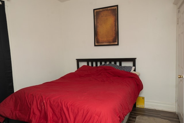 7042 S Carpenter St, Chicago, IL 60621 - bedroom featuring wood finished floors and baseboards