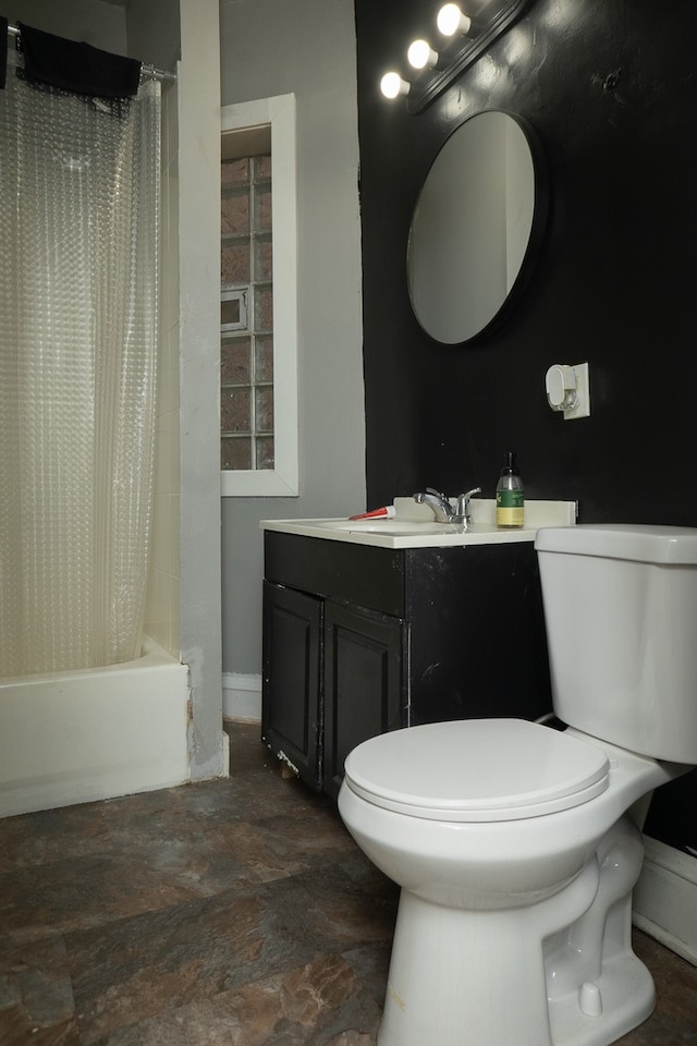 7042 S Carpenter St, Chicago, IL 60621 - full bathroom featuring vanity, shower / tub combo with curtain, and stone finish flooring