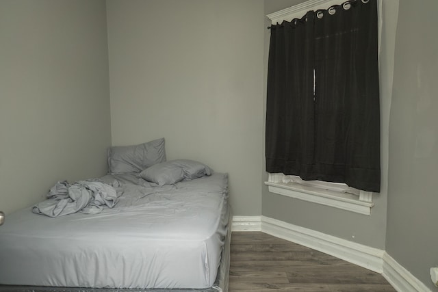 7042 S Carpenter St, Chicago, IL 60621 - bedroom with wood finished floors and baseboards