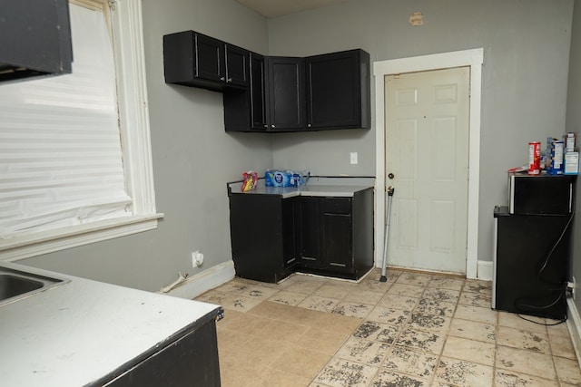 7042 S Carpenter St, Chicago, IL 60621 - washroom featuring baseboards
