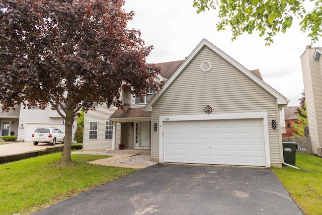 10 Sugar Creek Ct, Lake In The Hills, IL 60156 - view of front facade featuring asphalt driveway, a front yard, and an attached garage