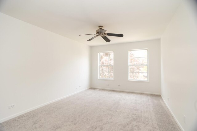 10 Sugar Creek Ct, Lake In The Hills, IL 60156 - unfurnished room featuring a ceiling fan and light carpet