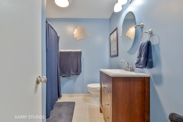full bath with tile patterned floors and vanity