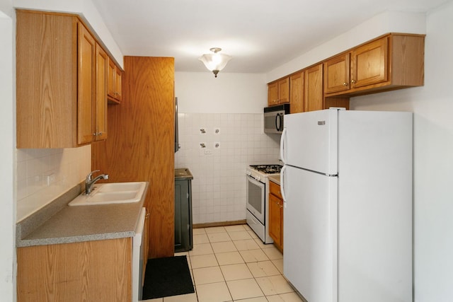 9407 S Roberts Rd Unit 3Se, Hickory Hills, IL 60457 - kitchen featuring white appliances, brown cabinetry, light tile patterned floors, tile walls, and light countertops