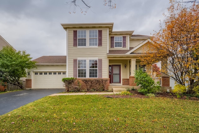 233 Pawtucket Ave, Elgin, IL 60124 - traditional home with driveway, an attached garage, brick siding, and a porch