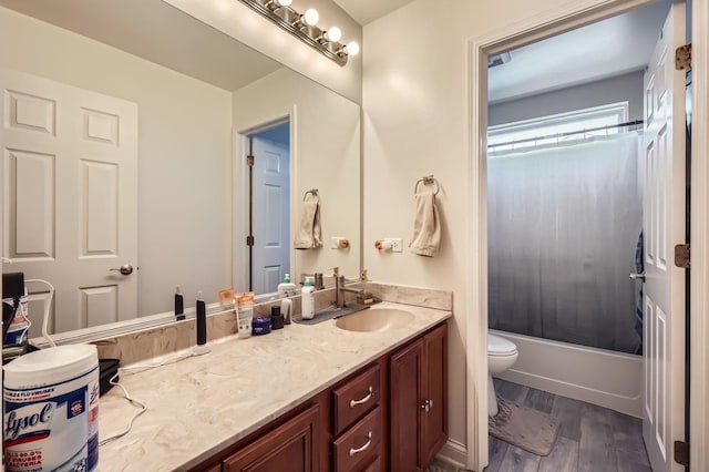 233 Pawtucket Ave, Elgin, IL 60124 - bathroom featuring vanity, wood finished floors, and shower / bath combo with shower curtain