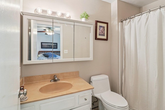 5506 W Chasefield Cir, Mchenry, IL 60050 - bathroom featuring vanity, ceiling fan, and curtained shower